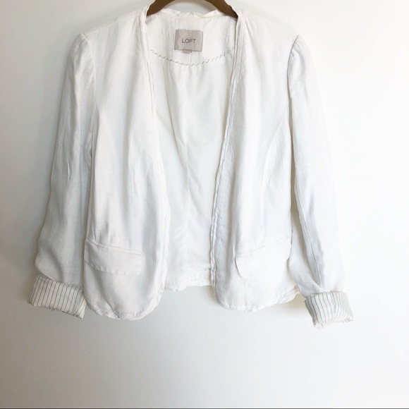 white collarless jacket